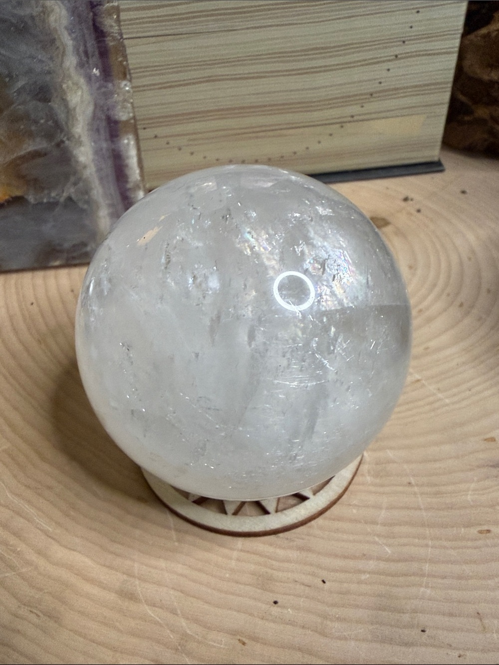 Calcite sphere with rainbows